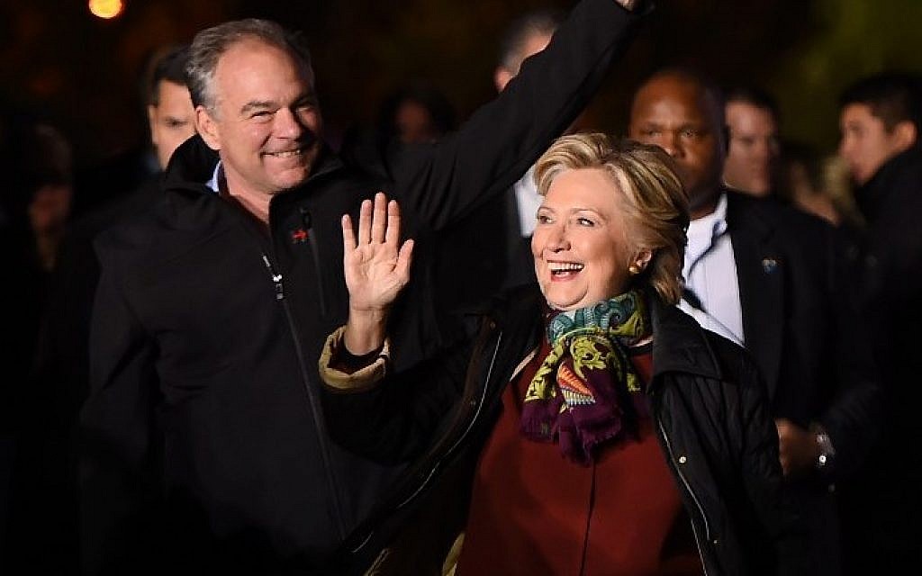 Democratic presidential nominee Hillary Clinton, right, attends a campaign event with running mate Tim Kaine, at Dunning-Cohen Champions Field, Penn Park in Philadelphia, Pennsylvania, October 22, 2016. (AFP/Robyn Beck) Democratic presidential nominee Hillary Clinton, right, attends a campaign event with running mate Tim Kaine, at Dunning-Cohen Champions Field, Penn Park in Philadelphia, Pennsylvania, October 22, 2016. (AFP/Robyn Beck)