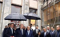 Palestinian leader Mahmoud Abbas (3L) visits a part of the Turkish parliament building that was damaged during the July 15 failed coup attempt in Ankara, on October 24, 2016.   (AFP PHOTO / ADEM ALTAN)