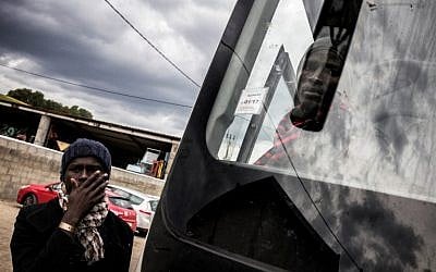 A migrant arrives by bus from the Calais Jungle, on October 24, 2016 at the Montlaville castle in Chardonnay. (AFP / Jeff Pachoud) 