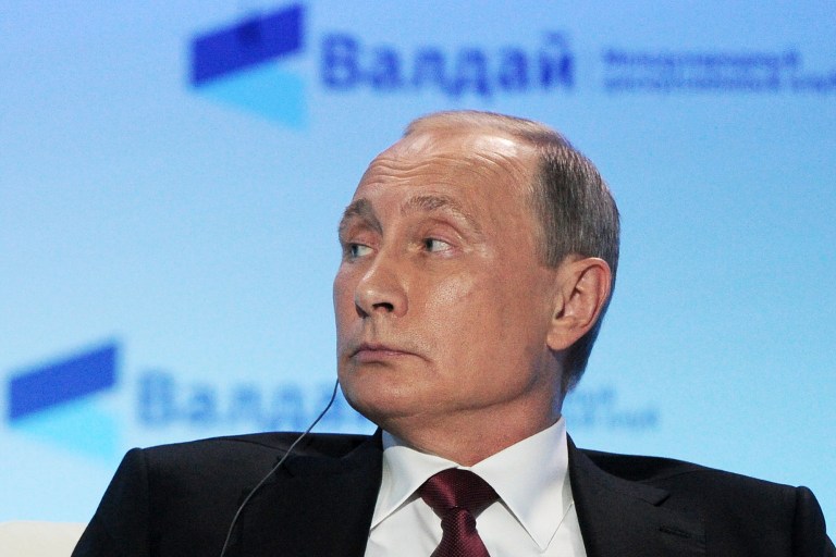 Russian President Vladimir Putin attends a Valdai Discussion Club meeting of political scientists in Sochi on October 27, 2016. (AFP PHOTO / SPUTNIK / Mikhail KLIMENTYEV) Russian President Vladimir Putin attends a Valdai Discussion Club meeting of political scientists in Sochi on October 27, 2016. (AFP PHOTO / SPUTNIK / Mikhail KLIMENTYEV)