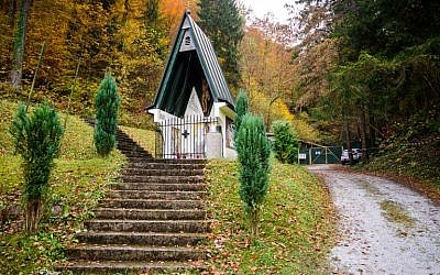 A picture taken on October 27, 2016 near town Lasko, Slovenia, shows a chapel near the entrance to Huda Jama mine where the remains of some 800 people were found in March 2009. (AFP PHOTO/Jure MAKOVEC)