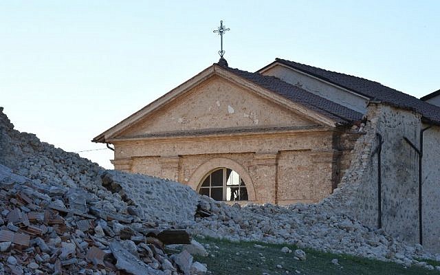 A collapsed wall after a 6.6 magnitude earthquake on October 30, 2016 in Norcia. (AFP PHOTO / ALBERTO PIZZOLI)