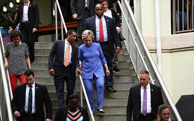 US Democratic presidential nominee Hillary Clinton leaves a pub after greeting supporters in Miami, Florida, on October 30, 2016. (AFP/Jewel SAMAD)