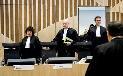 L to R: Judges arrive at a courthouse in Schiphol on October 31, 2016, for the start of the trial of Dutch anti-Islam MP Geert Wilders on charges of insulting a racial group and inciting racial hatred. (AFP PHOTO/ANP/Koen van Weel)