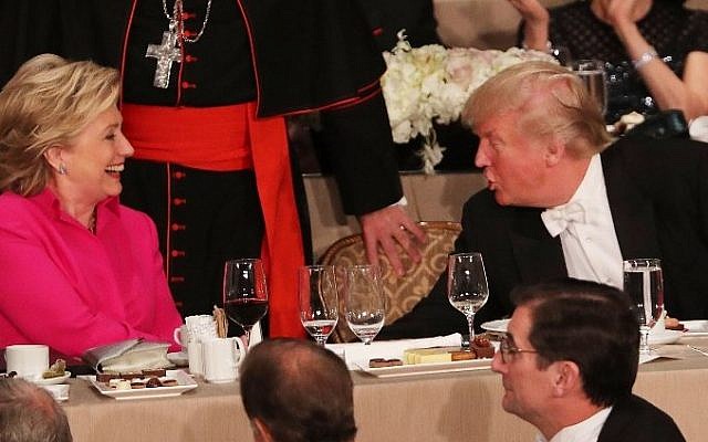 Hillary Clinton speaks briefly with Donald Trump while attending the annual Alfred E. Smith Memorial Foundation Dinner at the Waldorf Astoria on October 20, 2016 in New York City. Spencer Platt/Getty Images/AFP)