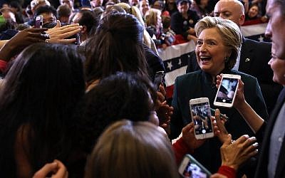 Democratic presidential nominee former Secretary of State Hillary Clinton greets supporters during a campaign rally at Cuyahoga Community College on October 21, 2016 in Cleveland, Ohio.  (Justin Sullivan/Getty Images/AFP)