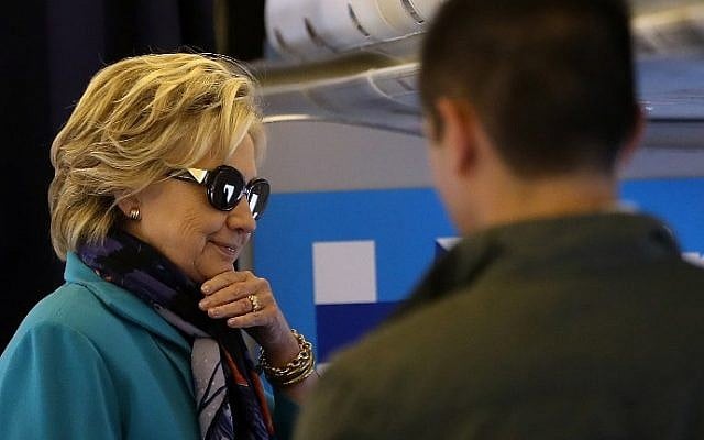 Democratic presidential nominee and former secretary of state Hillary Clinton talks with members of her staff aboard her campaign plane at Westchester County Airport in White Plains, New York on October 29, 2016. (Justin Sullivan/Getty Images/AFP) Democratic presidential nominee and former secretary of state Hillary Clinton talks with members of her staff aboard her campaign plane at Westchester County Airport in White Plains, New York on October 29, 2016. (Justin Sullivan/Getty Images/AFP)
