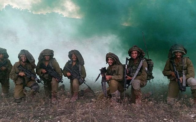 Illustrative photo: Soldiers in the mixed gender Cheetah Battalion participate in a squad exercise in southern Israel on November 16, 2015. (IDF Spokesperson's Unit/Flickr) Illustrative photo: Soldiers in the mixed gender Cheetah Battalion participate in a squad exercise in southern Israel on November 16, 2015. (IDF Spokesperson's Unit/Flickr)