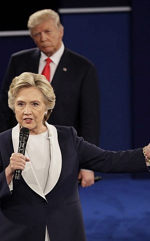 Republican presidential nominee Donald Trump listens to Democratic presidential nominee Hillary Clinton during the second presidential debate at Washington University in St. Louis, October 9, 2016. (AP/John Locher) 