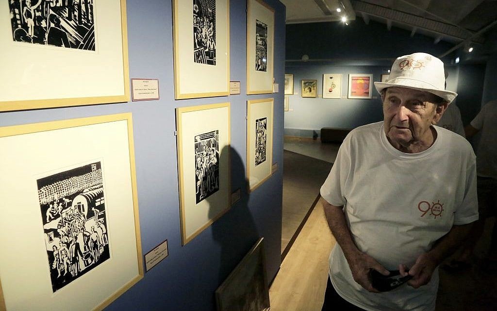 In this Thursday, Sept. 8, 2016 photo, Murray Greenfield, 90, walks around an exhibition about interned Jews at the Center of Visual Arts and Research in capital Nicosia, Cyprus. (AP Photo/Petros Karadjias) In this Thursday, Sept. 8, 2016 photo, Murray Greenfield, 90, walks around an exhibition about interned Jews at the Center of Visual Arts and Research in capital Nicosia, Cyprus. (AP Photo/Petros Karadjias)