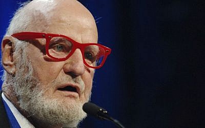 In this Nov. 16, 2005 file photo, author Lawrence Ferlinghetti reads a poem after he was awarded the Literarian Award for Outstanding Service to the American Literary Community at the National Book Awards in New York. (AP Photo/Henny Ray Abrams, File)