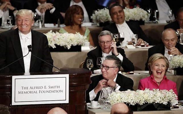 US Republican presidential candidate Donald Trump (left), speaks at the 71st Annual Alfred E. Smith Memorial Foundation Dinner in New York as Democratic presidential candidate Hillary Clinton (right), listens, October 20, 2016. (AP/Frank Franklin II) US Republican presidential candidate Donald Trump (left), speaks at the 71st Annual Alfred E. Smith Memorial Foundation Dinner in New York as Democratic presidential candidate Hillary Clinton (right), listens, October 20, 2016. (AP/Frank Franklin II)