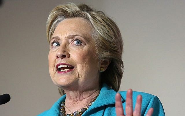 Democratic presidential candidate Hillary Clinton comments on the latest developments with the FBI and an investigation into her emails, during a campaign rally at the Dickerson Community Center in Daytona Beach, Fla., Saturday, Oct. 29, 2016. (Joe Burbank/Orlando Sentinel via AP)