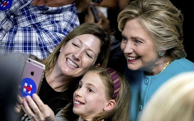 Democratic presidential candidate Hillary Clinton takes a photograph with supporters at a campaign office in Seattle, Washington, Friday, Oct. 14, 2016. (AP Photo/Andrew Harnik) Democratic presidential candidate Hillary Clinton takes a photograph with supporters at a campaign office in Seattle, Washington, Friday, Oct. 14, 2016. (AP Photo/Andrew Harnik)