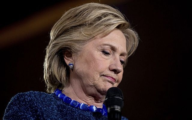 Democratic presidential candidate Hillary Clinton pauses while speaking at a rally at Theodore Roosevelt High School in Des Moines, Iowa, Friday, Oct. 28, 2016. (AP Photo/Andrew Harnik) Democratic presidential candidate Hillary Clinton pauses while speaking at a rally at Theodore Roosevelt High School in Des Moines, Iowa, Friday, Oct. 28, 2016. (AP Photo/Andrew Harnik)