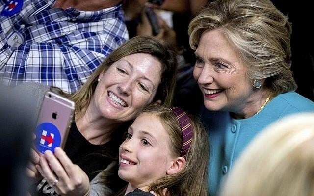Democratic presidential candidate Hillary Clinton takes a photograph with supporters at a campaign office in Seattle, Friday, October 14, 2016. (AP Photo/Andrew Harnik) Democratic presidential candidate Hillary Clinton takes a photograph with supporters at a campaign office in Seattle, Friday, October 14, 2016. (AP Photo/Andrew Harnik)