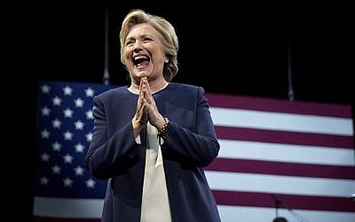 Democratic presidential candidate Hillary Clinton takes the stage at a fundraiser at the Civic Center Auditorium in San Francisco, Thursday, Oct. 13, 2016. (AP Photo/Andrew Harnik)
