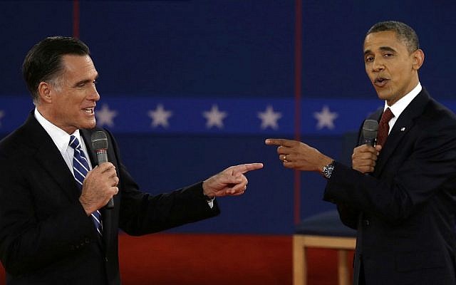 In this Oct. 16, 2012 file photo, Republican presidential nominee Mitt Romney, left, and President Barack Obama spar during the second presidential debate at Hofstra University in Hempstead, New York. (AP Photo/Charlie Neibergall, File)