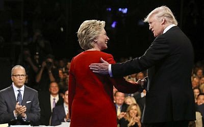 Democratic presidential nominee Hillary Clinton and Republican rival Donald Trump shake hands during the first presidential debate at Hofstra University in Hempstead, New York on Sept. 26, 2016. (Joe Raedle/Pool via AP, File) Democratic presidential nominee Hillary Clinton and Republican rival Donald Trump shake hands during the first presidential debate at Hofstra University in Hempstead, New York on Sept. 26, 2016. (Joe Raedle/Pool via AP, File)