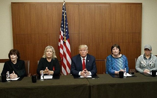 Republican presidential candidate Donald Trump, center, sits with, from right, Paula Jones, Kathy Shelton, Juanita Broaddrick, and Kathleen Willey, before the second presidential debate with Democratic presidential candidate Hillary Clinton at Washington University, Sunday, Oct. 9, 2016, in St. Louis. (AP Photo/ Evan Vucci) Republican presidential candidate Donald Trump, center, sits with, from right, Paula Jones, Kathy Shelton, Juanita Broaddrick, and Kathleen Willey, before the second presidential debate with Democratic presidential candidate Hillary Clinton at Washington University, Sunday, Oct. 9, 2016, in St. Louis. (AP Photo/ Evan Vucci)