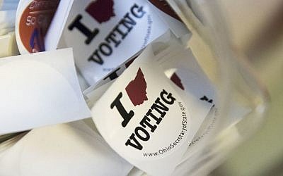 In this Oct. 12, 2016 photo, stickers available for voters are seen at the Hamilton County Board of Elections in Cincinnati, Ohio, as early voting begins statewide. (AP/John Minchillo)