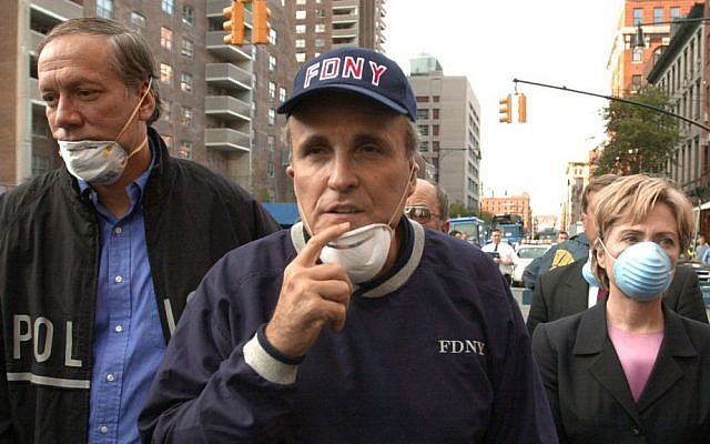 In this Wednesday, Sept. 12, 2001 file photo, then-New York City mayor Rudolph Giuliani, center, leads New York governor George Pataki, left, and senator Hillary Clinton, D-New York, on a tour of the site of the World Trade Center attack. (AP Photo/Robert F. Bukaty, File) In this Wednesday, Sept. 12, 2001 file photo, then-New York City mayor Rudolph Giuliani, center, leads New York governor George Pataki, left, and senator Hillary Clinton, D-New York, on a tour of the site of the World Trade Center attack. (AP Photo/Robert F. Bukaty, File)