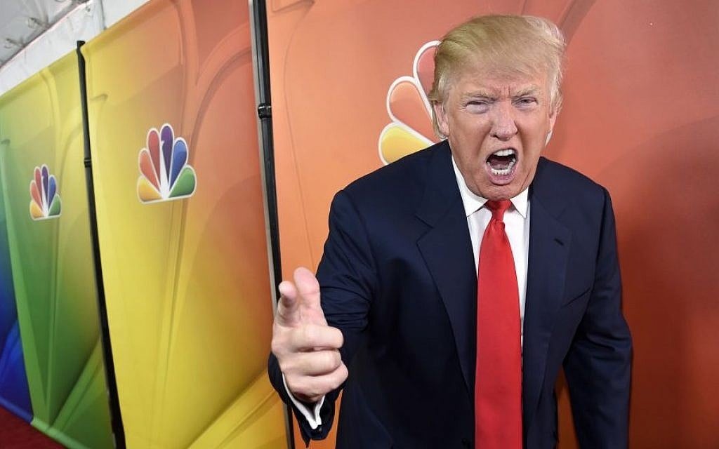 Donald Trump, then-host of the reality television series 'The Celebrity Apprentice,' poses for photographers, January 16, 2015. (Chris Pizzello/Invision/AP) Donald Trump, then-host of the reality television series 'The Celebrity Apprentice,' poses for photographers, January 16, 2015. (Chris Pizzello/Invision/AP)