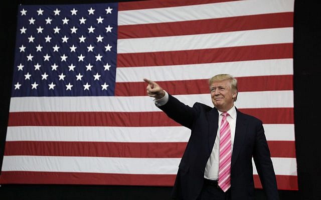 Republican presidential candidate Donald Trump takes the stage at a rally, Saturday, October 1, 2016, in Manheim, Pennsylvania (AP/John Locher)