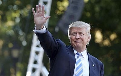 Donald Trump waves to the crowd after finishing his speech at a campaign stop at Regent University in Virginia Beach, Virginia, on Saturday, Oct. 22, 2016. (Steve Earley/The Virginian-Pilot via AP)