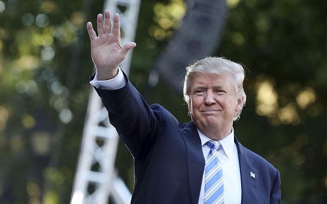 Donald Trump waves to the crowd after finishing his speech at a campaign stop at Regent University in Virginia Beach, Virginia, on Saturday, Oct. 22, 2016. (Steve Earley/The Virginian-Pilot via AP)