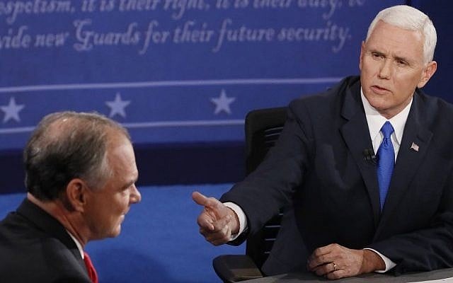 Republican vice presidential nominee Gov. Mike Pence, right, and Democratic vice presidential nominee Sen. Tim Kaine speak during the vice presidential debate at Longwood University in Farmville, Virginia, October 4, 2016. (Andrew Gombert/Pool via AP)