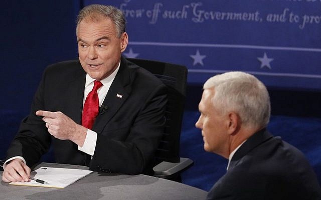 Republican vice-presidential nominee Gov. Mike Pence, right, and Democratic vice-presidential nominee Sen. Tim Kaine speak during the vice-presidential debate at Longwood University in Farmville, Va., October 4, 2016. (Andrew Gombert/Pool via AP) 