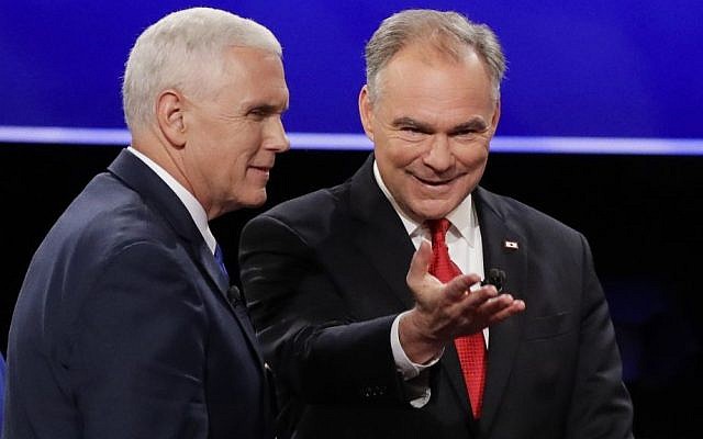 Republican vice-presidential nominee Gov. Mike Pence, left, and Democratic vice-presidential nominee Sen. Tim Kaine walk off the stage after the vice-presidential debate at Longwood University in Farmville, Va., October 4, 2016. (AP/David Goldman)