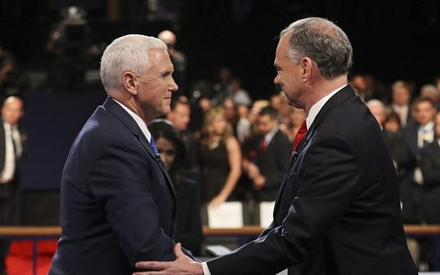 Republican vice-presidential nominee Governor Mike Pence and Democratic vice-presidential nominee Senator Tim Kaine shake hands after the vice-presidential debate at Longwood University, Virginia, October 4, 2016. (Joe Raedle/Pool via AP) 