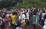 People march during an annual religious festival in Bishoftu, a town southeast of Ethiopia's capital, Addis Ababa, Sunday, Oct. 2, 2016. (AP Photo)