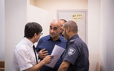 Head of the regional council of the Arab town of Julis, Salman Amar, seen at the Rishon Leztion court after shooting to death a gardening contractor outsite the city council, on September 6, 2016. (Nati Shohat/Flash90)