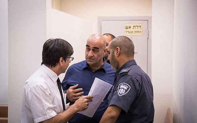 Head of the regional council of the Arab town of Julis, Salman Amar, seen at the Rishon Leztion court after shooting to death a gardening contractor outsite the city council, on September 6, 2016. (Nati Shohat/Flash90) Head of the regional council of the Arab town of Julis, Salman Amar, seen at the Rishon Leztion court after shooting to death a gardening contractor outsite the city council, on September 6, 2016. (Nati Shohat/Flash90)