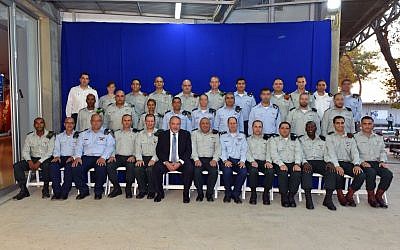 Defense Minister Avigdor Liberman and IDF Chief of Staff Gadi Eisenkot pose for a group picture at a ceremony for outstanding IDF officers on October 6, 2016 (Ariel Hermoni/Defense Ministry) Defense Minister Avigdor Liberman and IDF Chief of Staff Gadi Eisenkot pose for a group picture at a ceremony for outstanding IDF officers on October 6, 2016 (Ariel Hermoni/Defense Ministry)