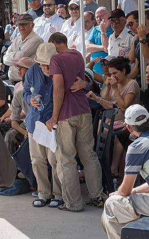 Family and friends attend the funeral of young siblings Ahinoam and Nevo Grinfeld, who were killed in a traffic accident in Georgia, at Mitzpeh Netufa in northern Israel on October 14, 2016. (Photo by Meir Vaaknin/FLASH90) Family and friends attend the funeral of young siblings Ahinoam and Nevo Grinfeld, who were killed in a traffic accident in Georgia, at Mitzpeh Netufa in northern Israel on October 14, 2016. (Photo by Meir Vaaknin/FLASH90)