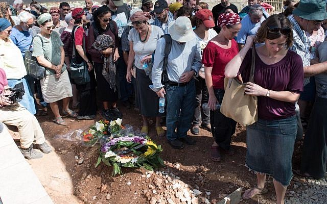 Family and friends attend the funeral of young siblings Ahinoam and Nevo Grinfeld, who were killed in a traffic accident in Georgia, at Mitzpeh Netufa in northern Israel on October 14, 2016. (Meir Vaaknin/Flash90) Family and friends attend the funeral of young siblings Ahinoam and Nevo Grinfeld, who were killed in a traffic accident in Georgia, at Mitzpeh Netufa in northern Israel on October 14, 2016. (Meir Vaaknin/Flash90)