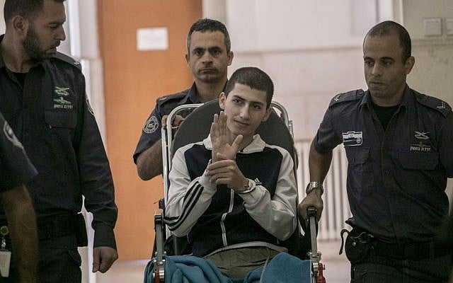 Ayman Kurd, 20, is escorted by Israeli prison officers at the District court in Jerusalem on October 20, 2016. (Yonatan Sindel/Flash90) Ayman Kurd, 20, is escorted by Israeli prison officers at the District court in Jerusalem on October 20, 2016. (Yonatan Sindel/Flash90)