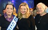 Sara Netanyahu (center) with the winner of a beauty pageant for Holocaust survivors, Anna Grinis, in Haifa on October 30, 2016. (Amos Ben Gershom/GPO)