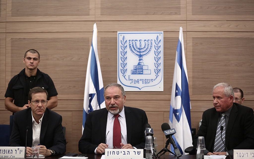 From left: Opposition Chairman Isaac Herzog, Defense Minister Avigdor Liberman and Likud MK Avi Dichter attend a meeting of the Defense and Foreign Affairs Committee at the Knesset on October 31, 2016. (Photo by Miriam Alster/Flash90)