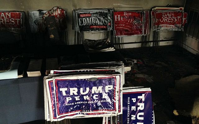 Melted campaign signs are seen at the Orange County Republican Headquarters in Hillsborough, North Carolina on Sunday, Oct. 16, 2016. (AP Photo/Jonathan Drew) Melted campaign signs are seen at the Orange County Republican Headquarters in Hillsborough, North Carolina on Sunday, Oct. 16, 2016. (AP Photo/Jonathan Drew)