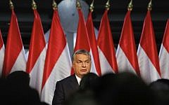 Hungarian Premier Viktor Orban looks at supporters before delivering a speech in Budapest, Hungary, Sunday, Oct. 2, 2016. (AP/Vadim Ghirda)