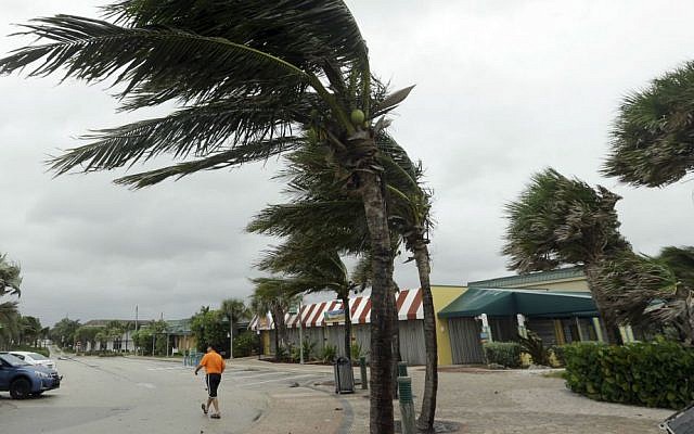 Palm trees sway in high gusts of wind, Thursday, Oct. 6, 2016, in Vero Beach, Florida. (AP Photo/Lynne Sladky) Palm trees sway in high gusts of wind, Thursday, Oct. 6, 2016, in Vero Beach, Florida. (AP Photo/Lynne Sladky)