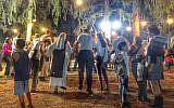 Revellers celebrate Simhat Torah at the Birkat Shalom synagogue in Kibbutz Gezer, October 23, 2016 (Sarah Tuttle-Singer)
