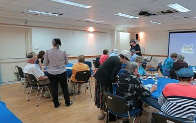 Attendees mingle before an afternoon movie is shown. (Yaakov Schwartz)