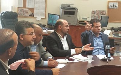 Joint (Arab) List chair Aymen Odeh (right) talking to party MKs at the weekly faction meeting, October 31, 2016. (Raoul Wootliff/Times of Israel) Joint (Arab) List chair Aymen Odeh (right) talking to party MKs at the weekly faction meeting, October 31, 2016. (Raoul Wootliff/Times of Israel)