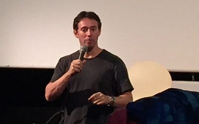 Avi Liberman takes questions at the Jerusalem premiere of his movie 'Comedy Road' on October 20, 2016 (Times of Israel)